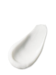Creamy lotion texture swatch showing quick absorption into skin.