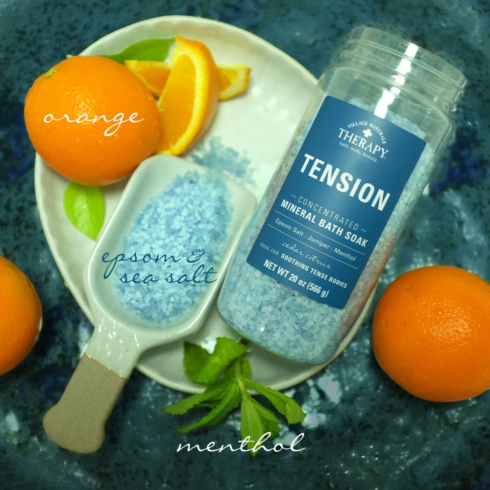 Village Naturals Therapy Bains Minéraux Tension, sels de mer et d'Epsom visibles pour une immersion minérale.