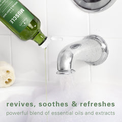 Shower scene with Village Naturals Therapy on a pouf for a refreshing cleanse