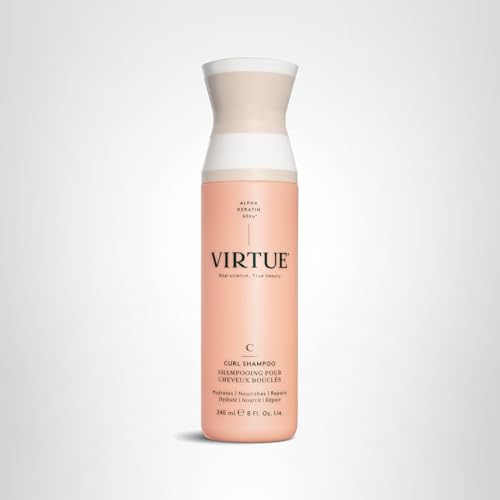 Texture crémeuse de VIRTUE Curl Jojoba offrant une hydratation agréable.
