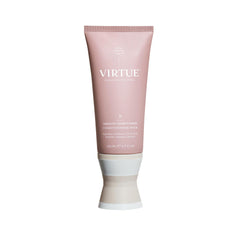 VIRTUE Smooth Conditioner sur la bouteille, promet un lissage sans frisottis.