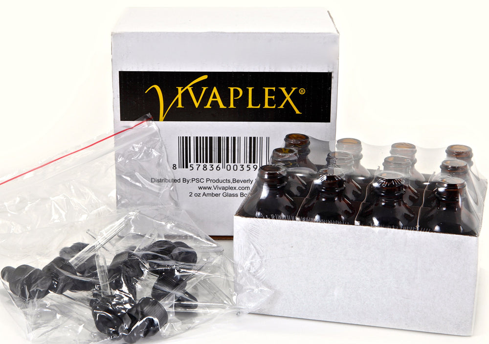 Gouttes en verre et bouchon noir sur une bouteille Vivaplex.