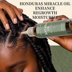 Vivccon Batana Oil applied to scalp with gentle massage.