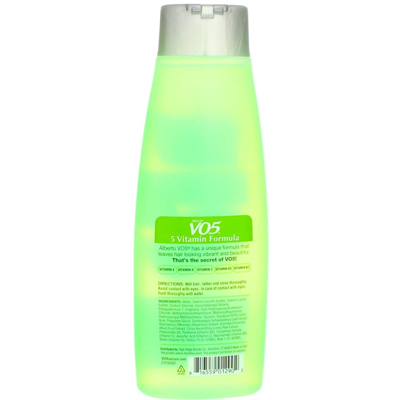 Bouteille VO5 dans la salle de bain, parfum d’agrumes frais.