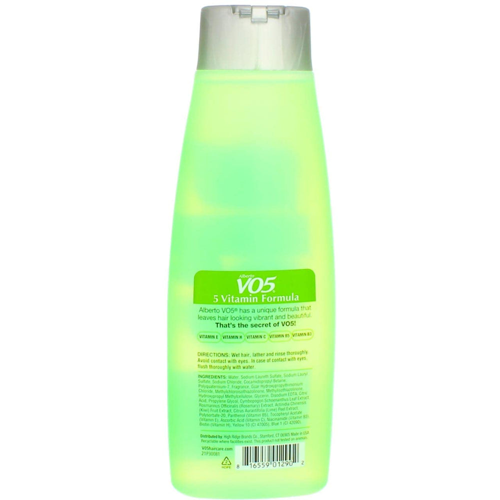 Bouteille VO5 dans la salle de bain, parfum d’agrumes frais.