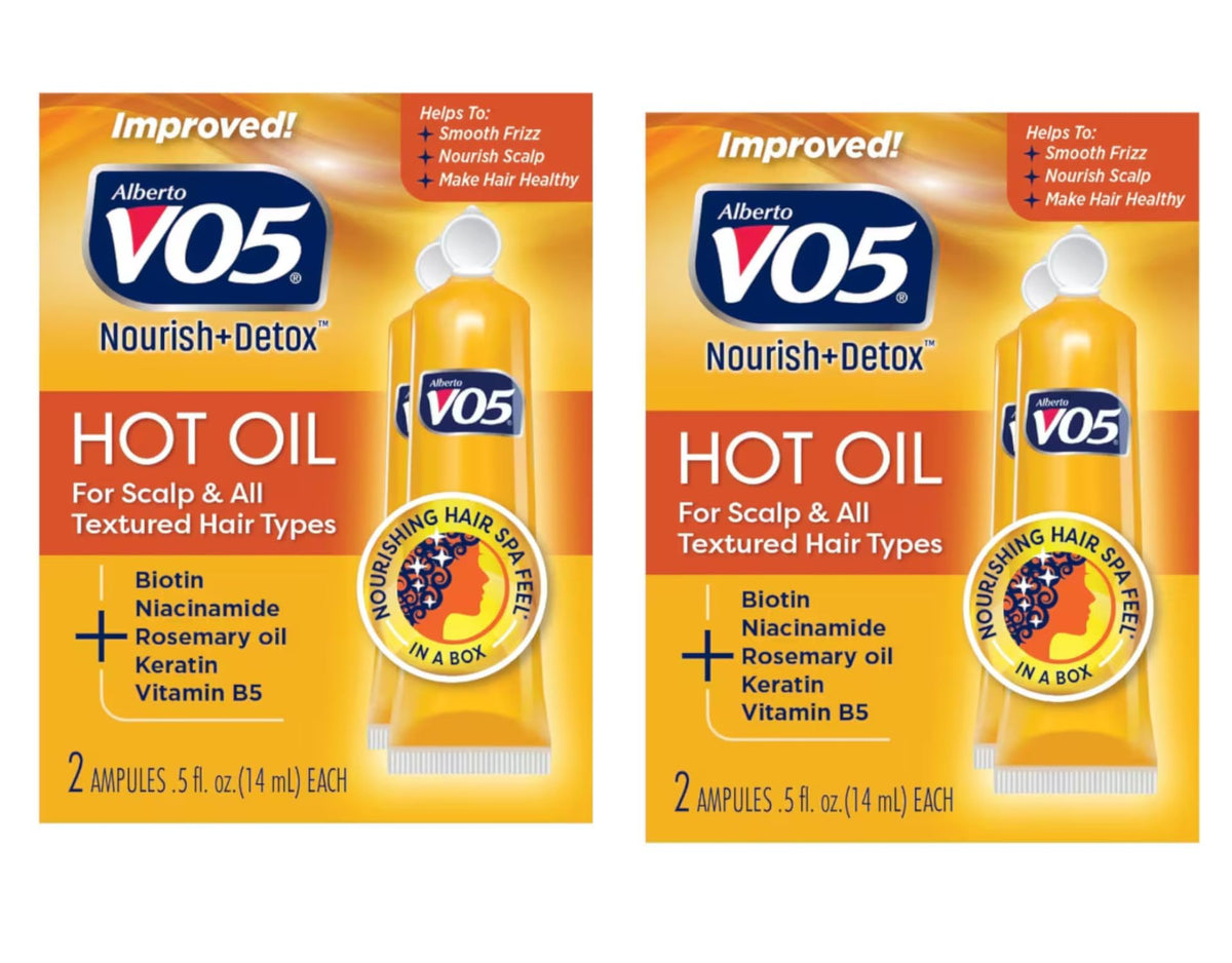 Vo5 Huile Chaude Thérapie Bouteille montrant l’hydratation capillaire.