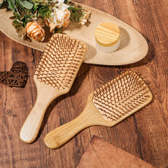 Brosse anti-statique Wanmu – réduit l'électricité statique pour des cheveux lisses.