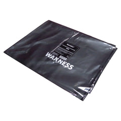Waxness tapis repelle cire et huile, propreté renforcée dans l’espace de soin.