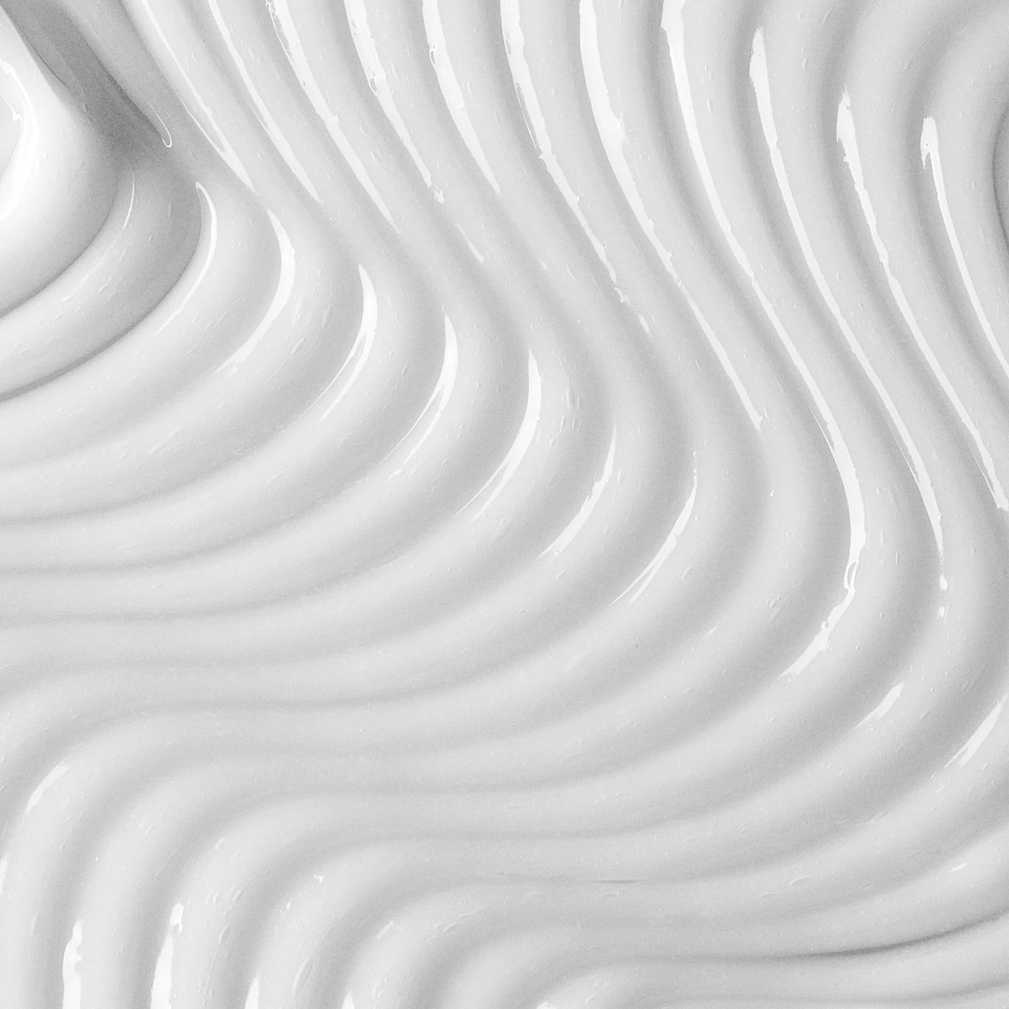 Texture crème légère du conditionneur WELLBEL, apporte douceur et souplesse.