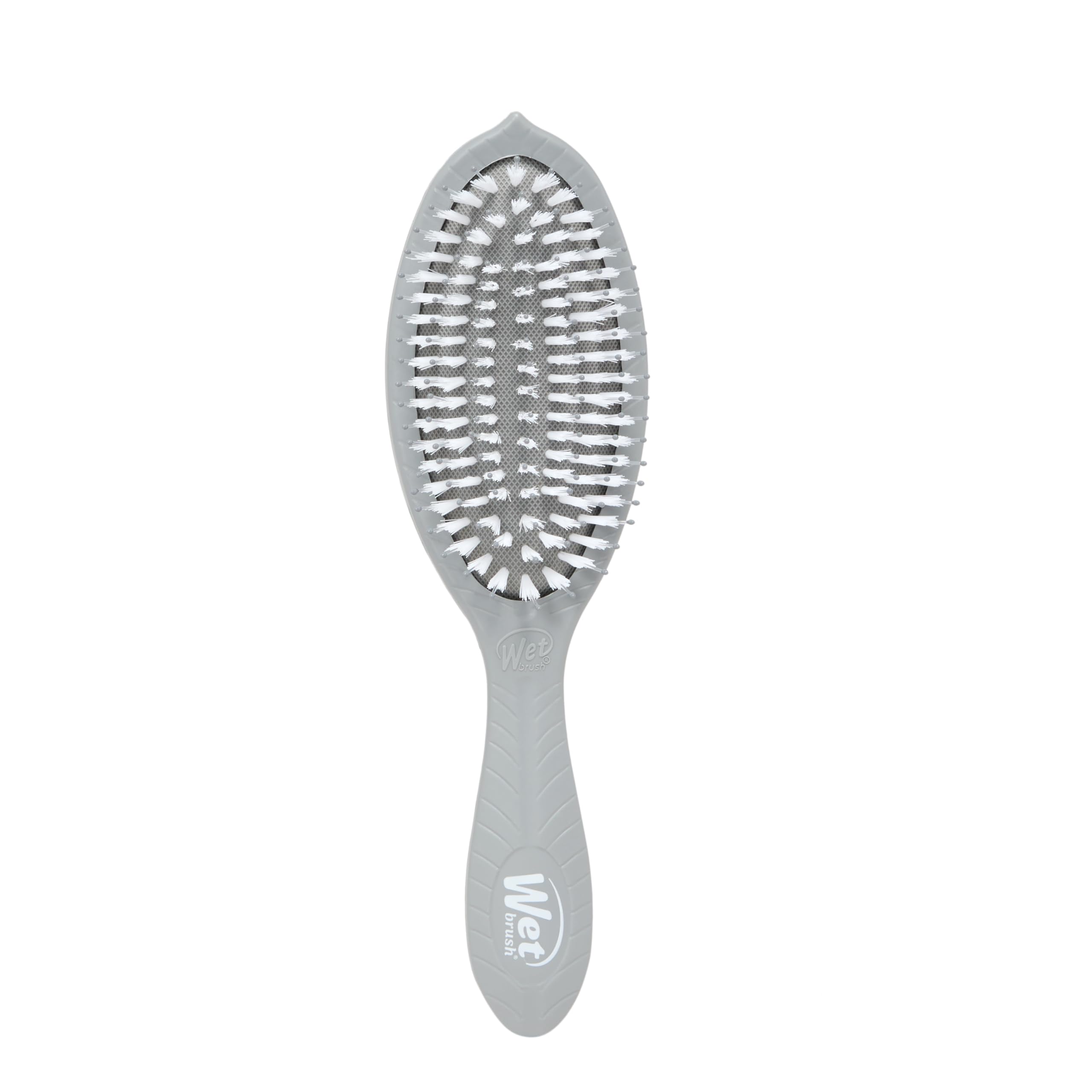 Brosse Wet Brush Go Green Charbon sur emballage, démontrant ses bénéfices démêlants.