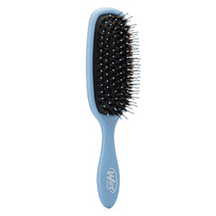 Wet Brush poils naturels de porc répartissent les huiles pour brillance.