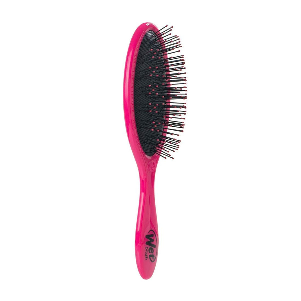 Wet Brush portable: brosse compacte pour démêlage en déplacement.