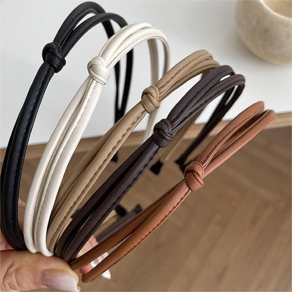 Bandeau fin en cuir noir WOVOWOVO, élégant et confortable pour un style quotidien.