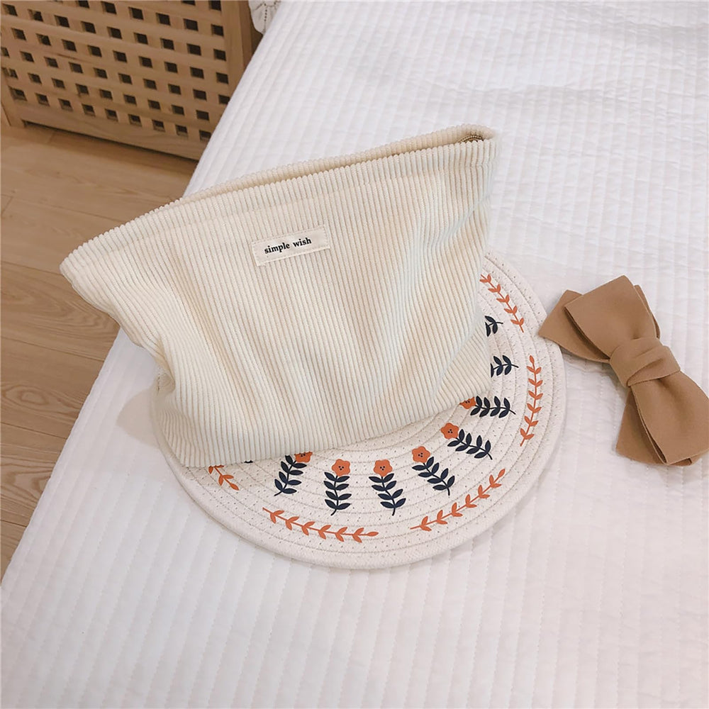 Fermeture éclair fiable sur la trousse Wudygirl pour éviter les fuites.