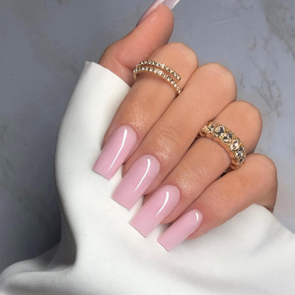 XCREANDO ongles à coller rose, fini carré, application rapide et aspect naturel.