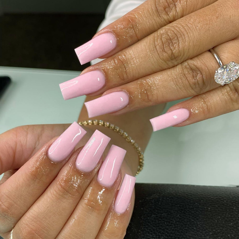 Ongles XCREANDO à poser rose, longueur moyenne, facilité d'utilisation et style chic.