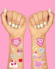 Tatouages xo Fetti Saint-Valentin motifs bonbons et citations, ambiance ludique garantie