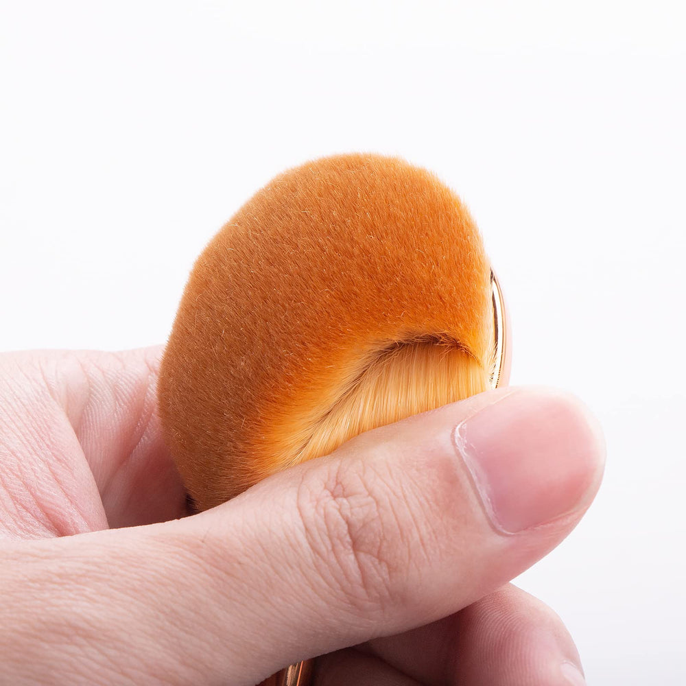 Pinceau poudre Yoseng oval, fini doux et uniforme.